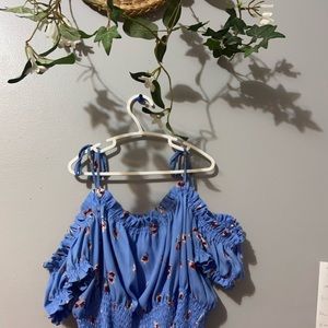 Blue off the shoulder tie stop